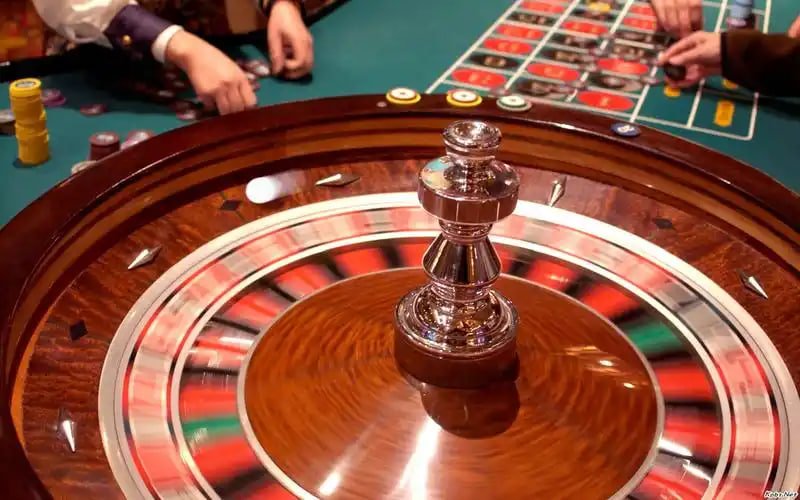 Live dealer baccarat table streamed on a mobile phone in the Philippines